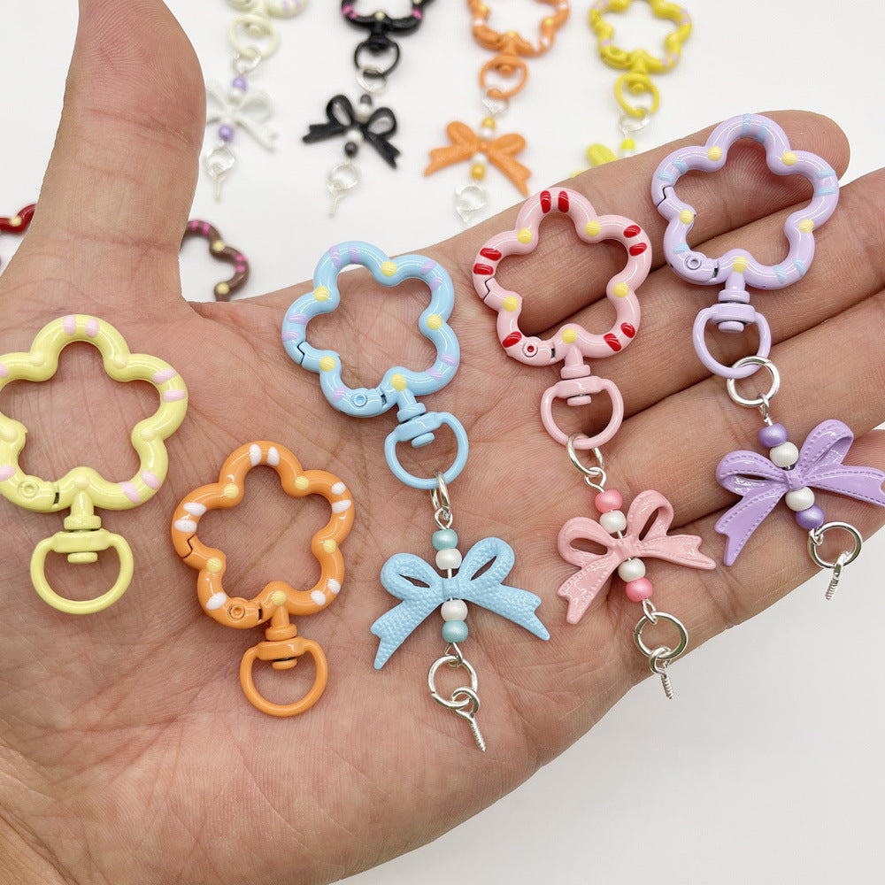 Small flower universal rotating spring buckle, flower opening ring, plum blossom spring ring, blind box perforated bean keychain DIY accessory